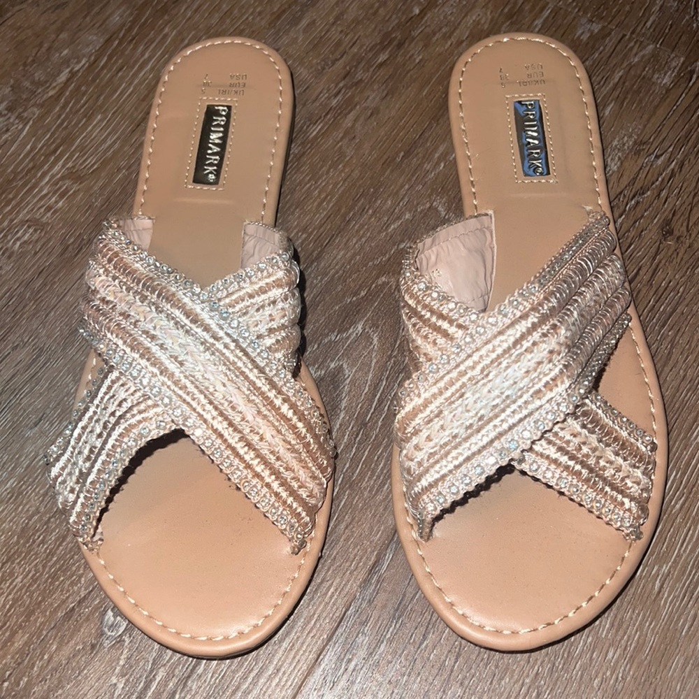 Pale pink embellished sandals/flip flops. Gently used.
